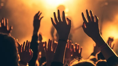 crowd with hands up