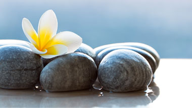 spa stones and flower