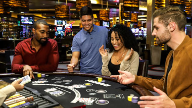Group playing blackjack at the M Resort