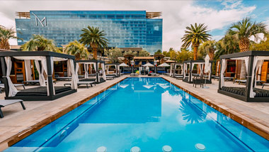 M Pool with Daybeds and M Resort in the background